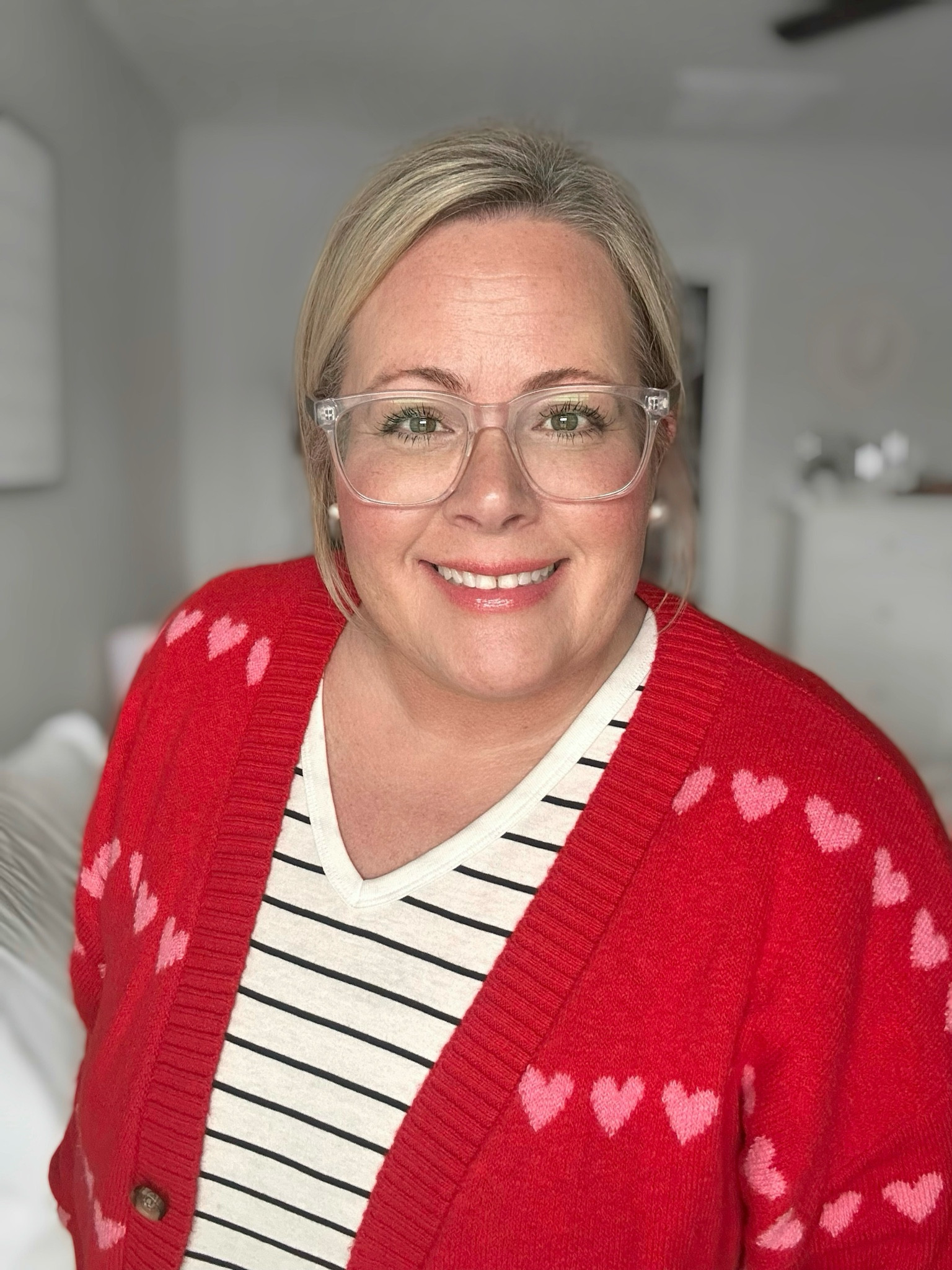 Ready to spread the love in this warm and cozy sweater. ❤️ Loved pairing it with the striped t-shirt too! 

#LTKSeasonal #LTKOver40 #LTKSaleAlert