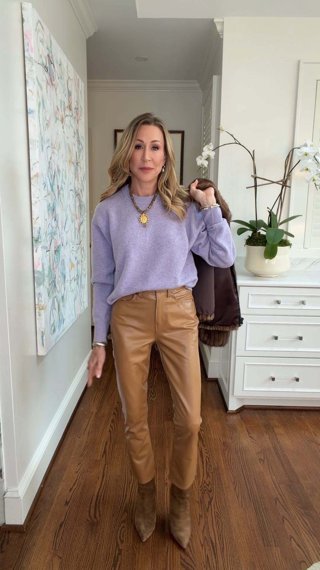 Dressing for the crazy weather but bringing in a little spring color!!  Lavender crewneck sweater, tan faux  leather pants, suede booties and a vintage fur.


#LTKootd #LTKSeasonal #LTKOver40