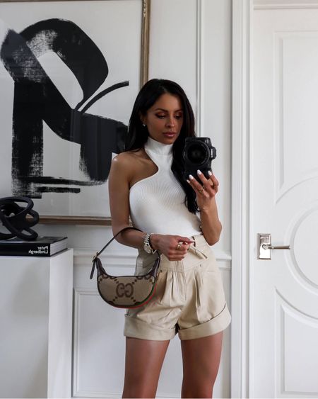 Summer outfit ideas
Revolver halter top
Similar belted shorts 
Chic summer top



#LTKStyleTip #LTKSeasonal #LTKFindsUnder100