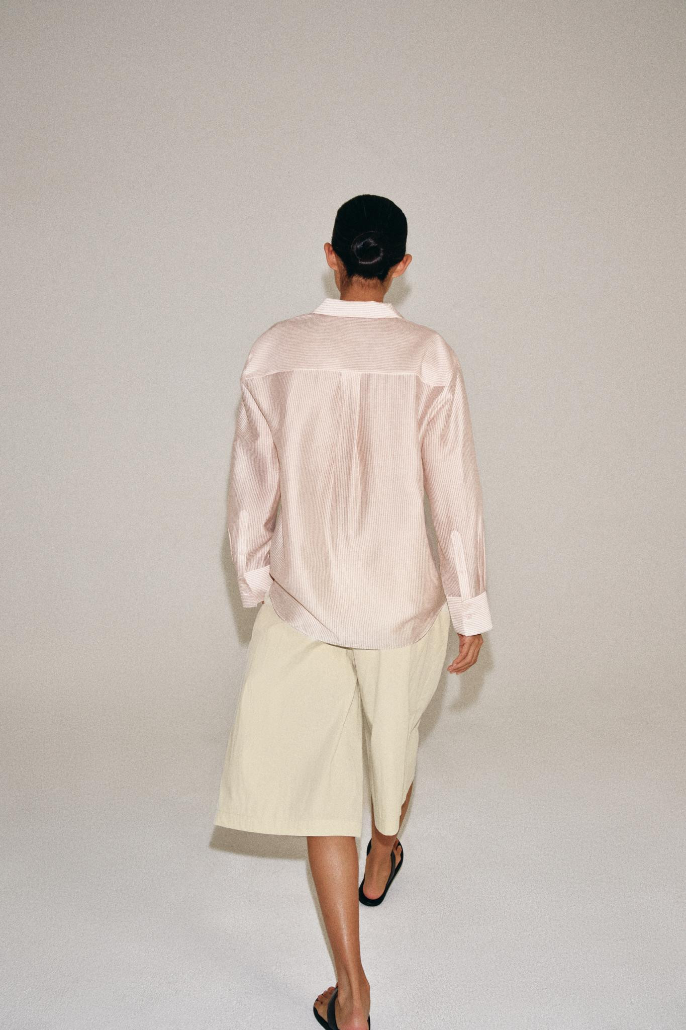 ZARA WOMAN COLLECTIONShirt made from a lyocell blend yarn. Featuring a regular collar and long cu... | Zara UK
