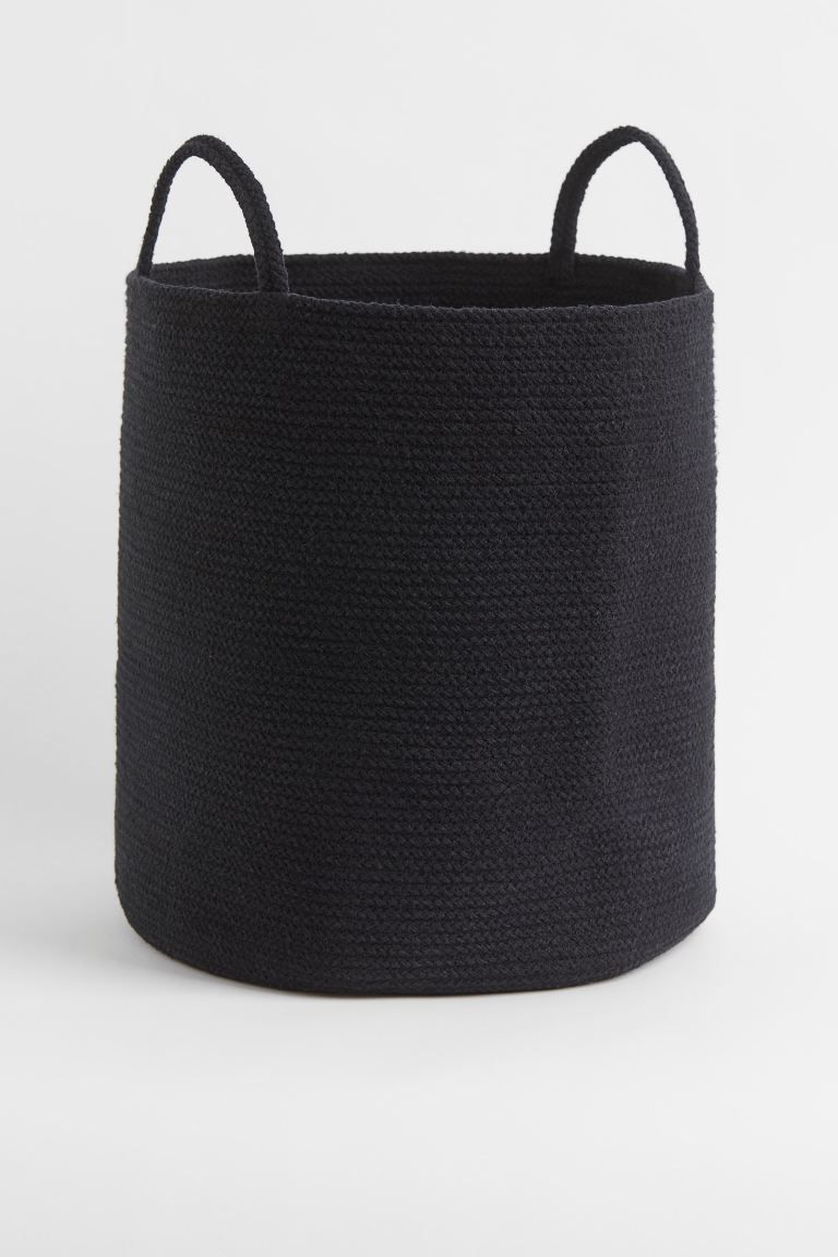 Conscious choice  Large storage basket in thick, woven cotton fabric with two handles at top. Dia... | H&M (US + CA)