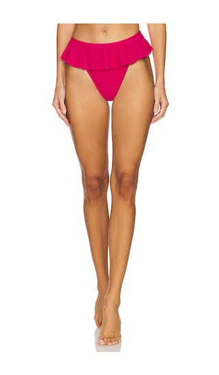 Tamarindo Ruffle Bikini Bottom in Raspberry | Revolve Clothing (Global)