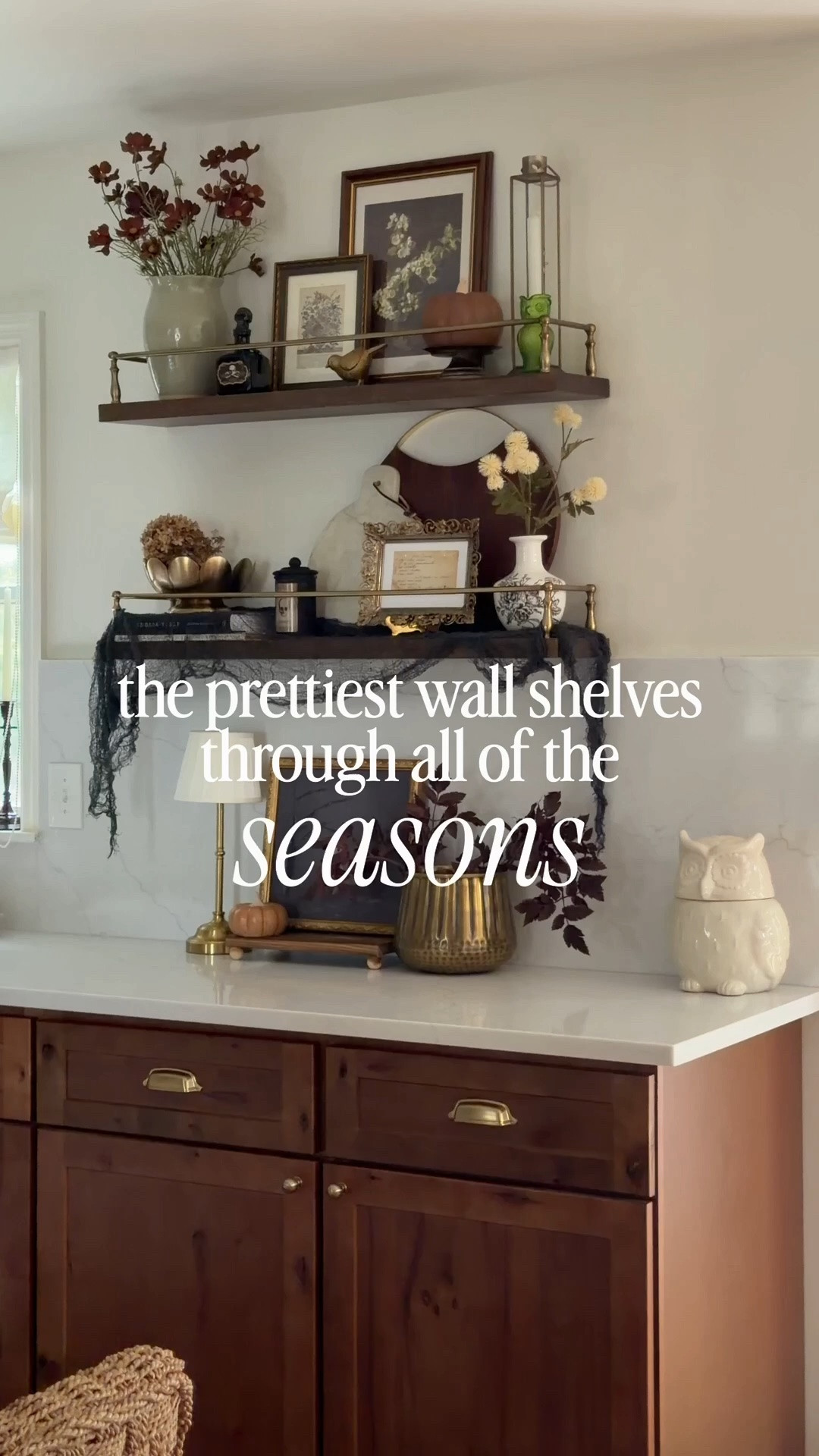 The cutest wall shelves with built in brass ledges