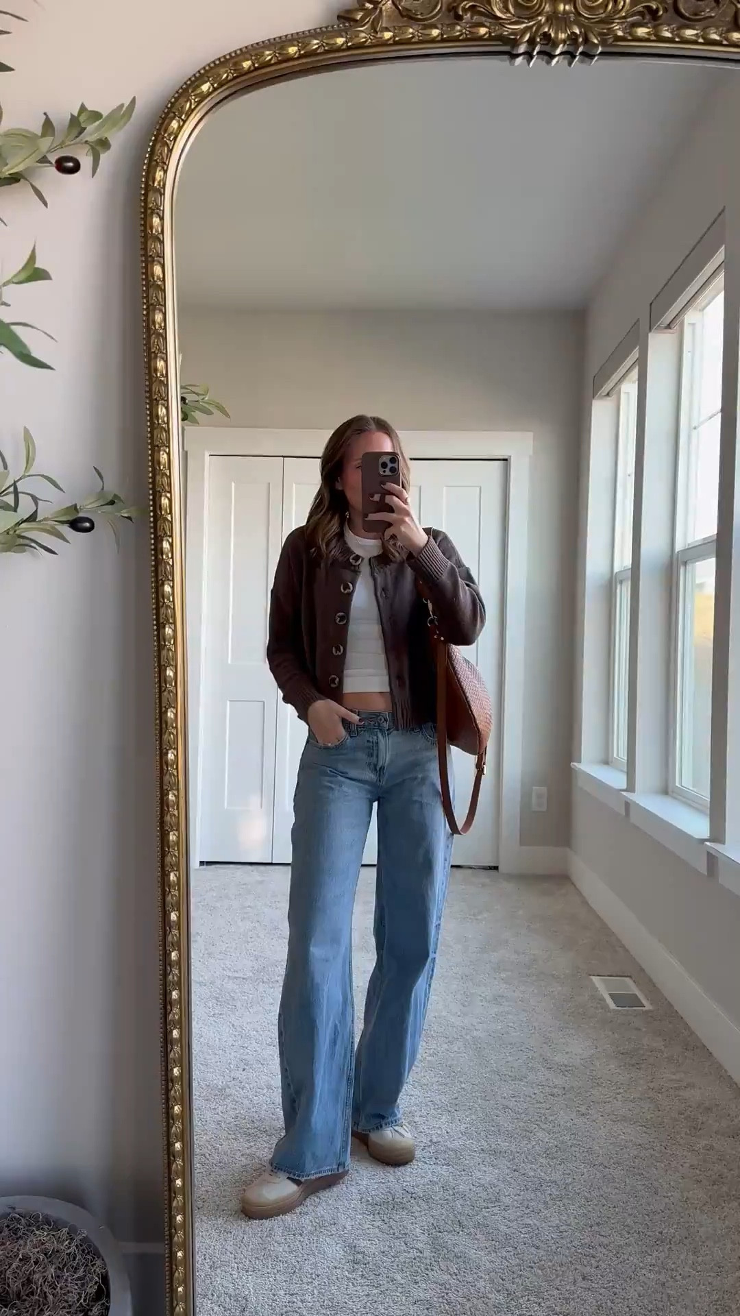 Cute and casual outfit. I absolutely love this cardigan and own it in a few colors! It’s the perfect little layer! Wearing a size small and size 25 denim 

Low rise denim | quince cardigan | brown cardi | casual style | woven bag |style over 30 

#LTKStyleTip #LTKFindsUnder100