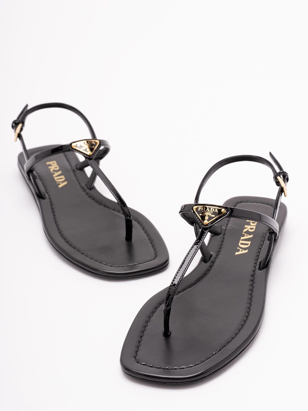prada patent leather flat sandals available on Spinnaker - 58321 | Spinnaker Boutique