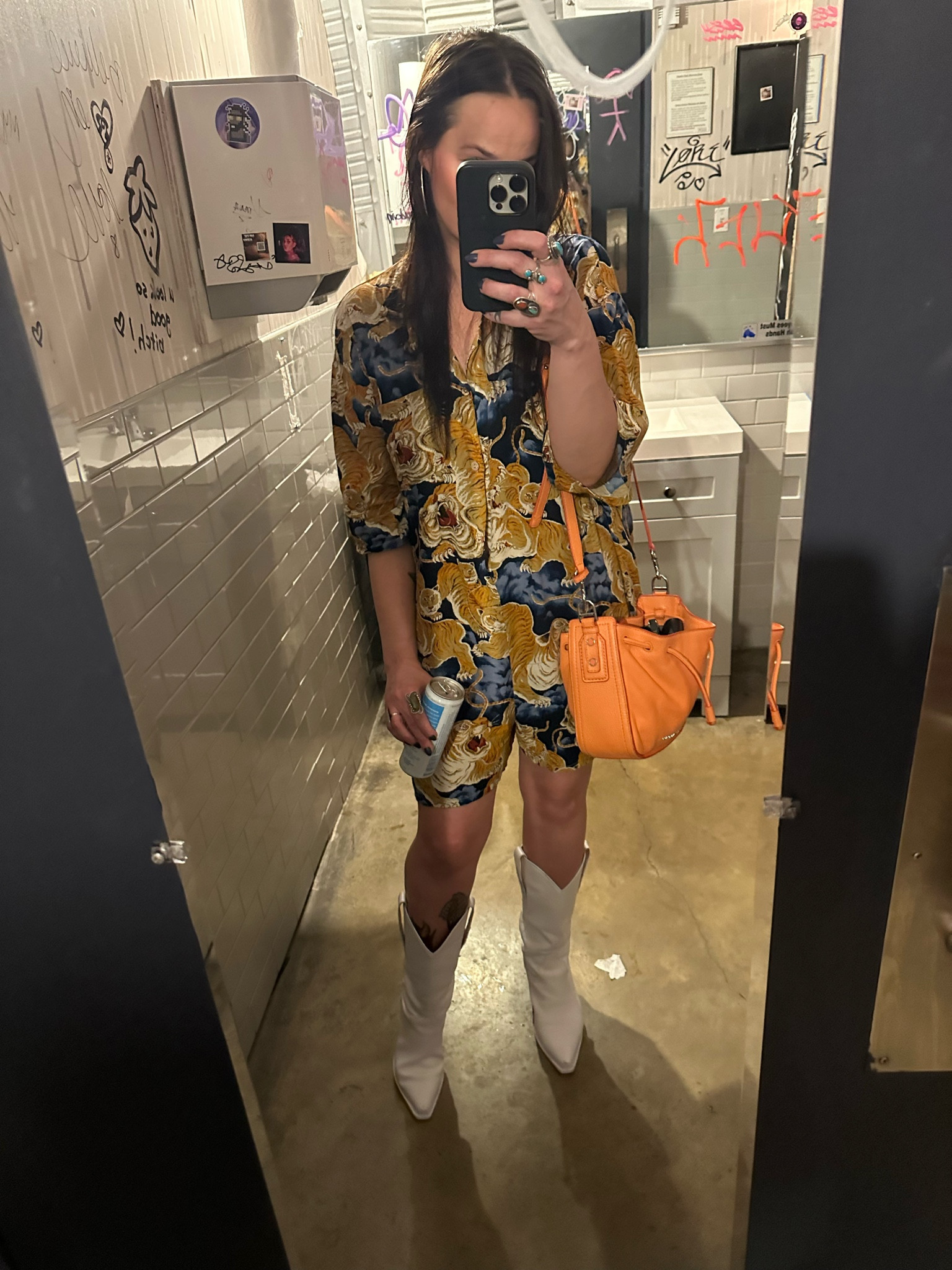 Loose, comfy, eye catching tiger print romper from R13 styled with Jeffrey Campbell dagget boots and Marc Jacobs bucket bag, worn to SXSW perfect for a festival or night out when style and comfort matters

#LTKFestival #LTKstyletip #LTKshoecrush