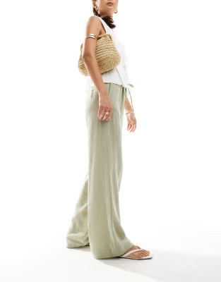 Bershka rustic textured tie waist trousers in light khaki | ASOS (Global)