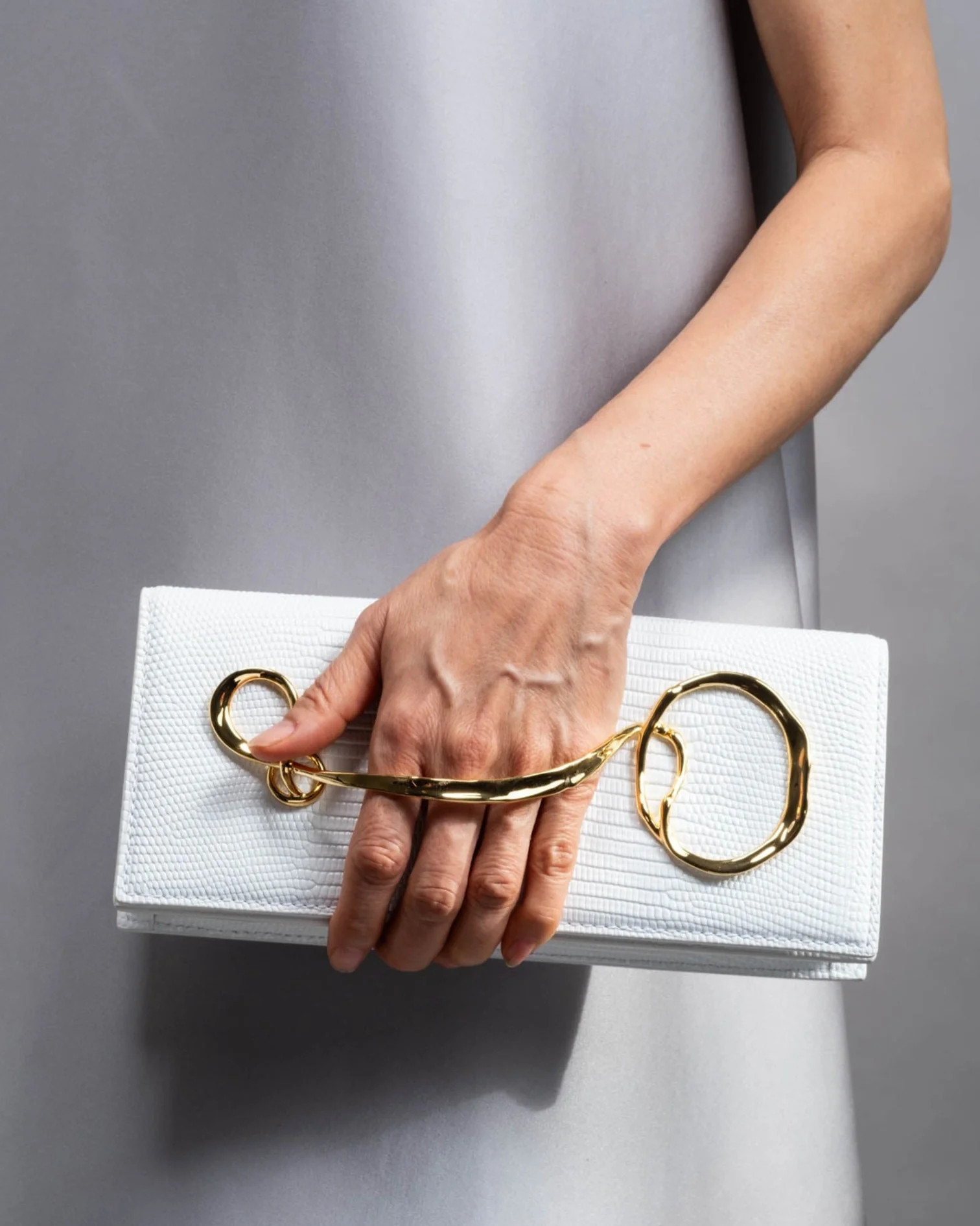 White Twisted Gold Side Handle Clutch Purse | White Lizard Leather Clutch | Alexis Bittar