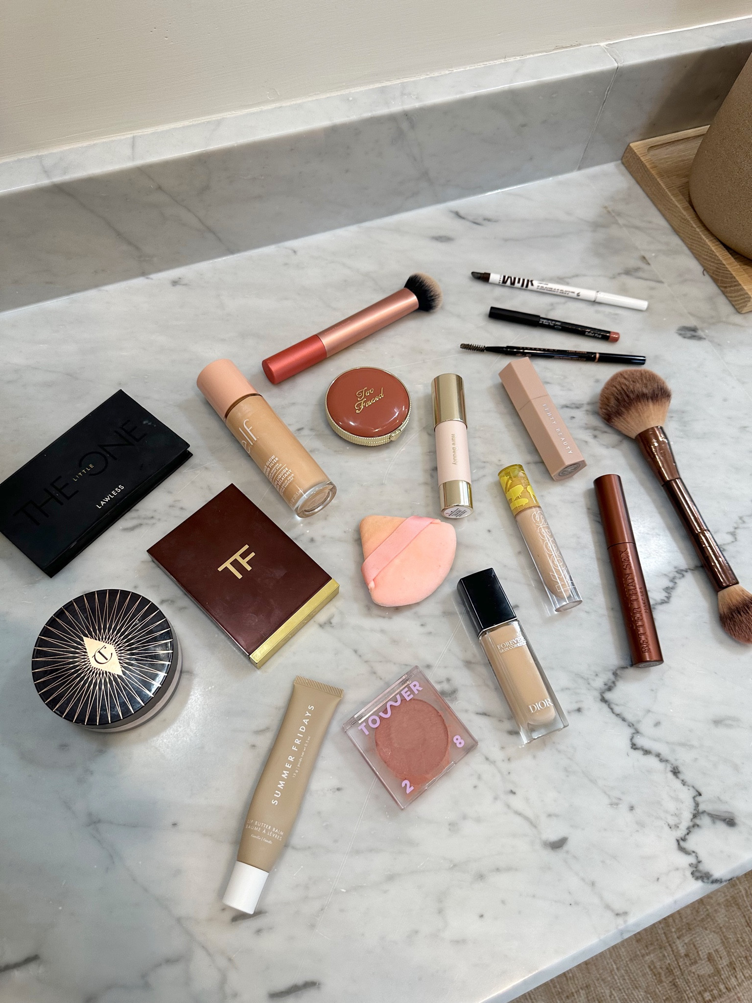 My current makeup routine:

- Anastasia Brow Wiz in shade Taupe 
- Milk Makeup Infinity Eye Pencil in shade Limitless 
- Elf Halo Glow Liquid Filter in shade 1 Fair
- Dior Forever Skin Correct Concealer in shade 0,5 N
- Kosas Revealer Concealor in shade 01 N
- Tower 28 BeachPlease Cream Blush in shade Magic Hour 
- Too Faced Cloud Crush Blurring Blush in shade Velvet Crush
- Rare Beauty Warm Wishes Effortless Bronzer Stick in shade Power Boost 
- Fenty Beauty Match Stix Matte Contour Skinstick in shade Amber
- Tom Ford Shade and Illuminate in shade Moodlight 
- Lawless the Little One Pallet 
- Too Faced Better Than Sex Volumizing Mascara in shade Chocolate 
- Bobbi Brown Lip Liner Pencil in shade Ballet Pink 
- Summer Fridays Lip Butter Balm in shade Vanilla 

#LTKstyletip #LTKSeasonal #LTKbeauty