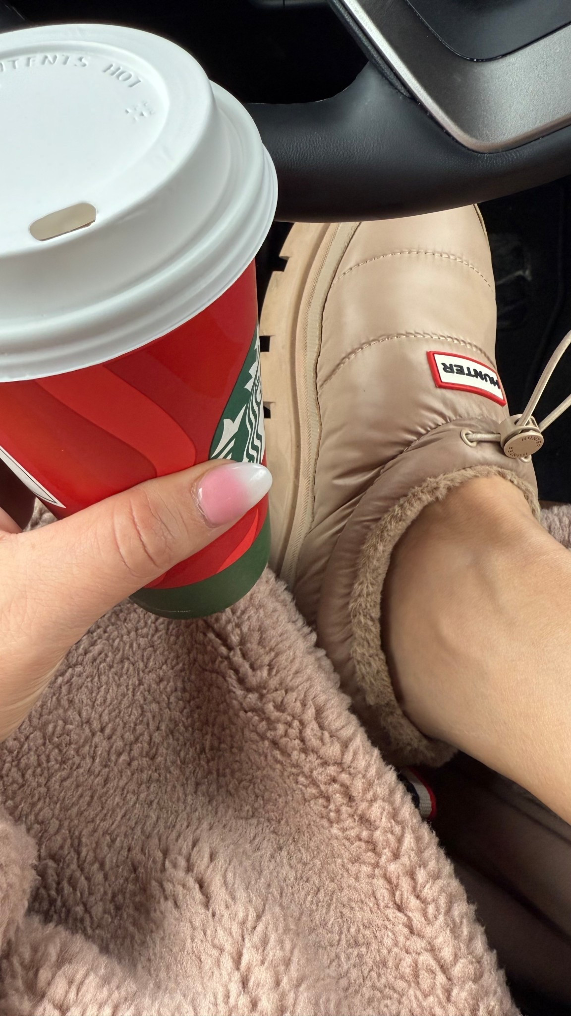 If you are a cold weather girl, this is exactly what you need. Warm, cute, comfortable, and waterproof Hunter shoes! 
They run big so if between, size down 