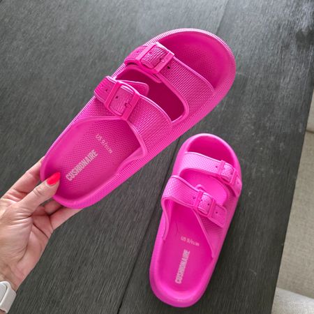 Cushionaire cloud slides with double buckle straps, currently 38% off and under $25. Lots of fun color options available, I'm normally an 8.5 and I order a 9 in this brand. Cloud slides, cloud foam slides, summer sandals, Amazon fashion, Amazon footwear

#LTKFindsUnder50 #LTKShoeCrush #LTKStyleTip