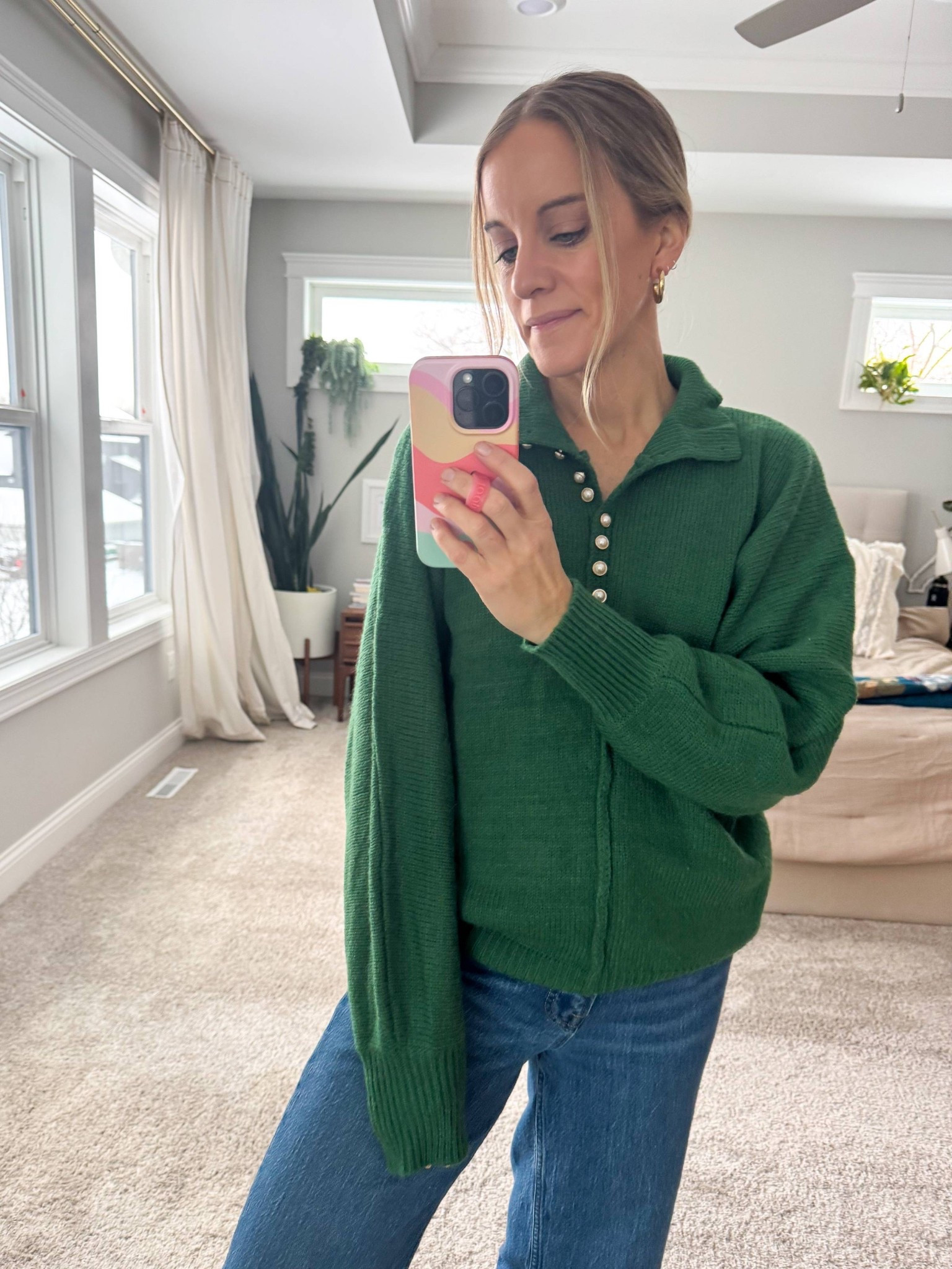 Wearing small in the top. These are the best jeans! Under $30 and so comfortable 