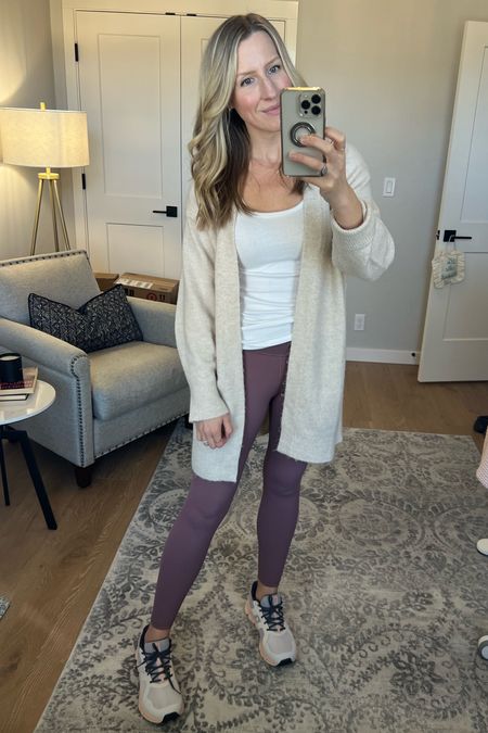 I love this casual athleisure style! These are the best high waisted leggings, tank top and cardigan. Pair with ON tennis shoes! 

#LTKshoecrush #LTKfitness #LTKfindsunder100