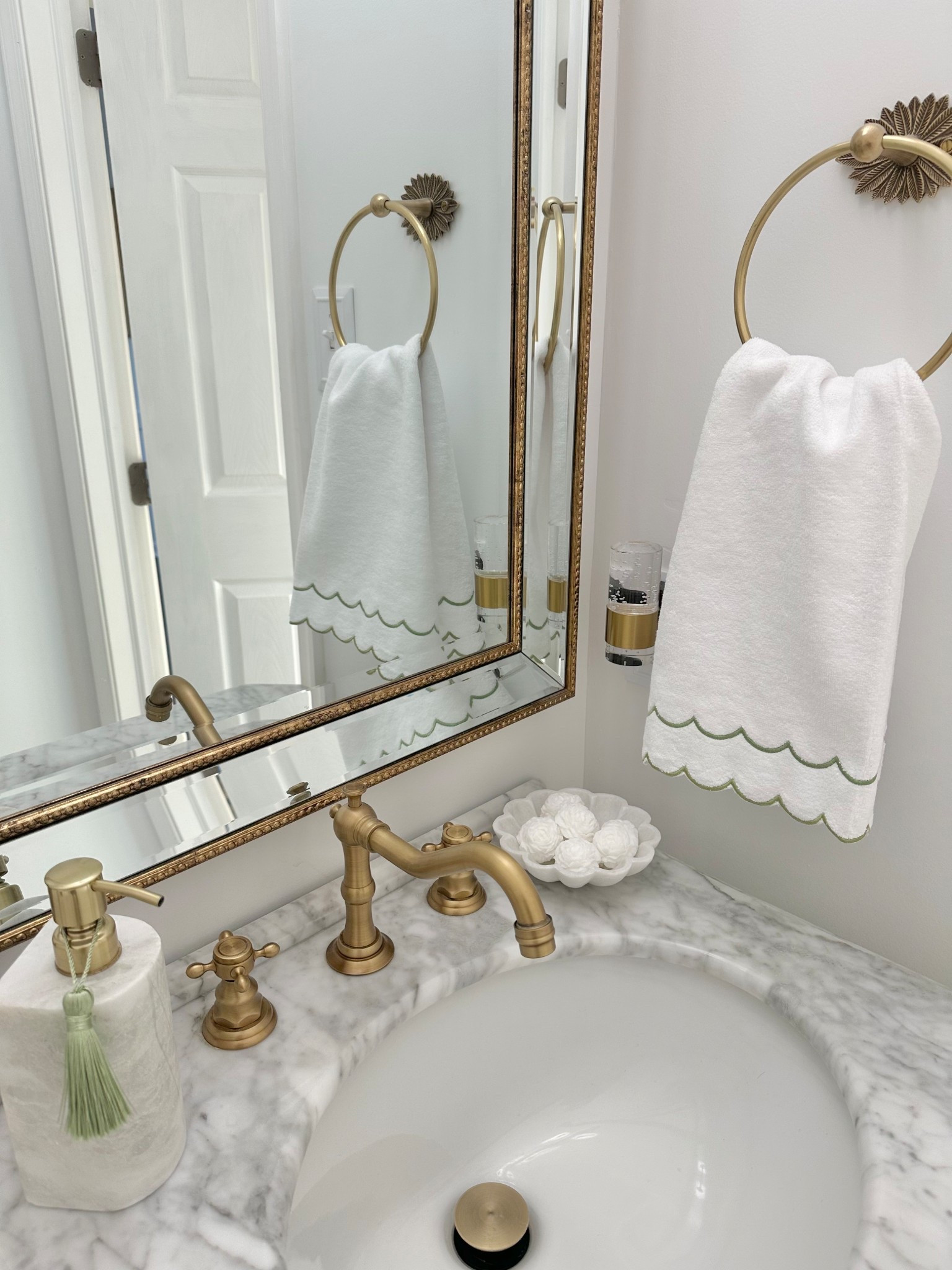 The most budget friendly way to add a little tiny pop of Spring in your powder room is to use these pretty scalloped hand towels, some lovely floral hand soaps and a pretty sage green tassel on your soap dispenser! So charming!￼

#LTKSeasonal #LTKSaleAlert #LTKHome