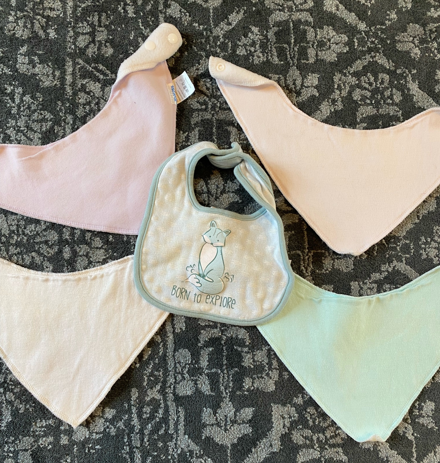 I can’t believe year old stains came out of these bibs SO WELL! I used Miss Mouths / Nellies Wow stick and some dreft and it WORKED! — though I hands down give Miss Mouths and the Nellie stick all the credit! 