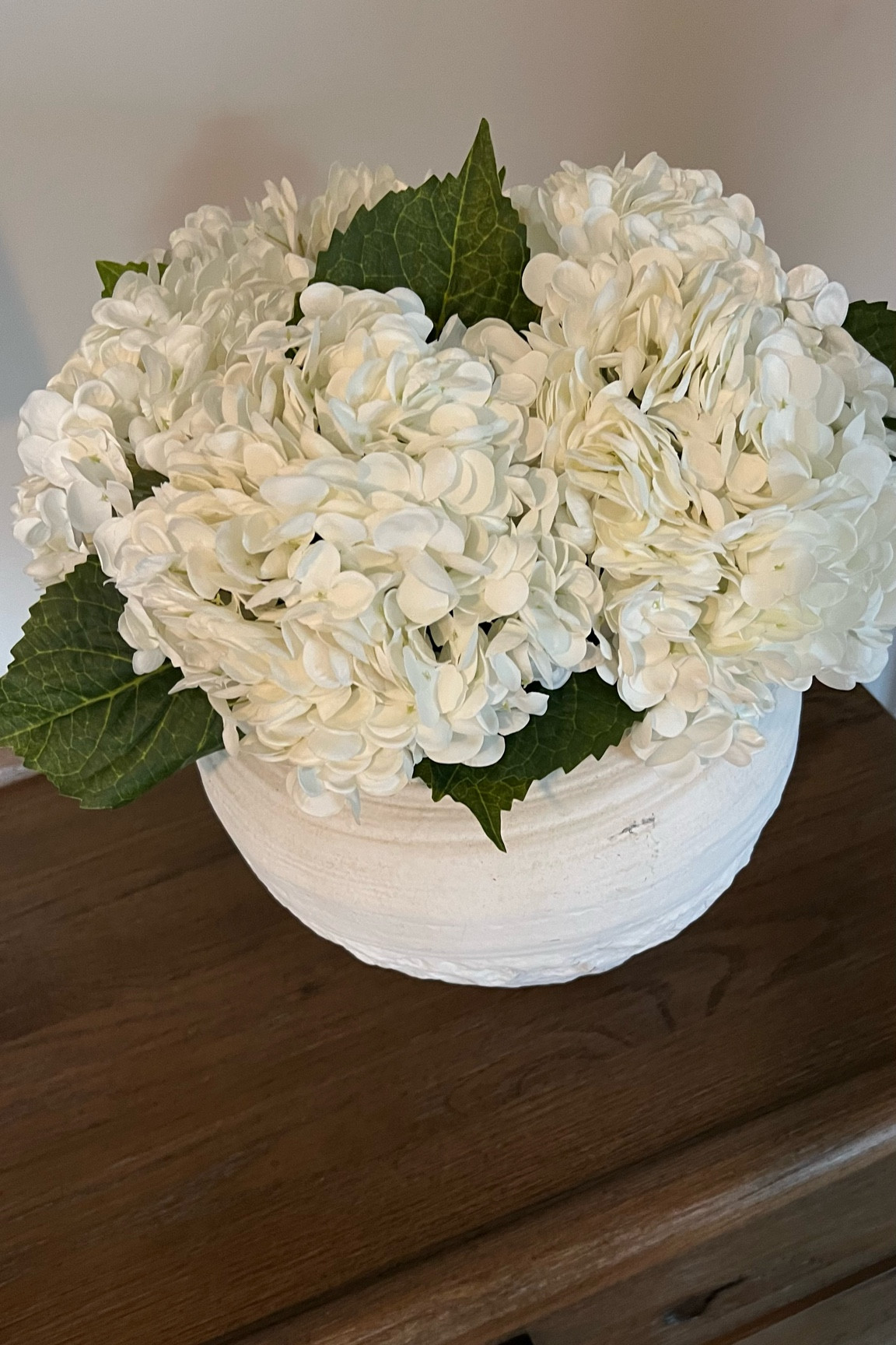 faux hydrangeas! this vase is from homegoods. 🤍 

Spring decor, fake flowers, fake hydrangeas, Nancy meyers arethetic, amazon home 

#LTKHome #LTKSeasonal #LTKFindsUnder50