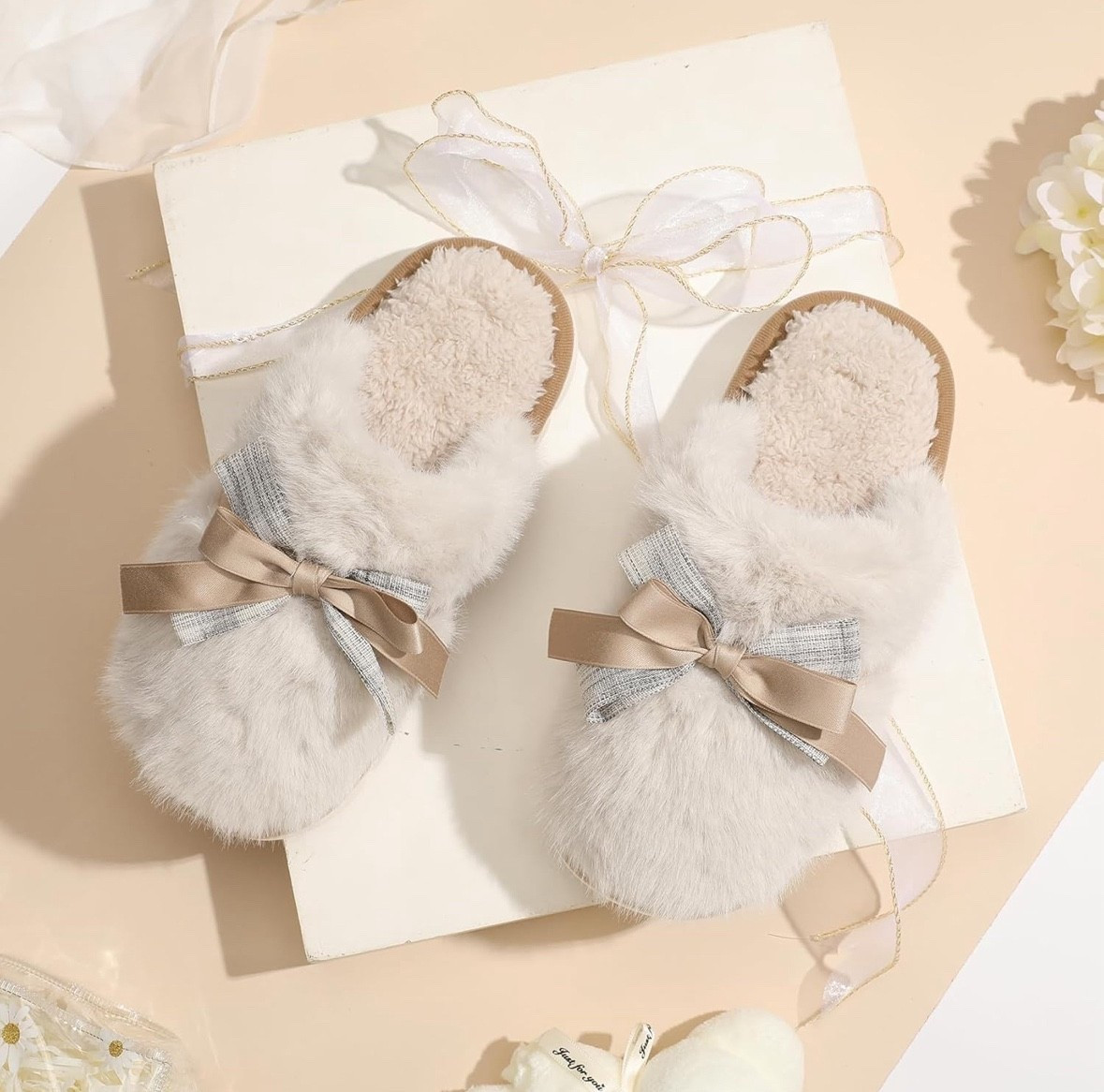 Absolutely adorable! On Sale, come in a ton of colors & are on Prime

Cute Women's Memory Foam House Slippers - Fuzzy Plush Faux Fur Slippers with Bow Butterfly Tie - Anti-Skid Indoor/Outdoor Gifts for Women, Moms & Ladies

#LTKSeasonal #LTKHome #LTKSaleAlert