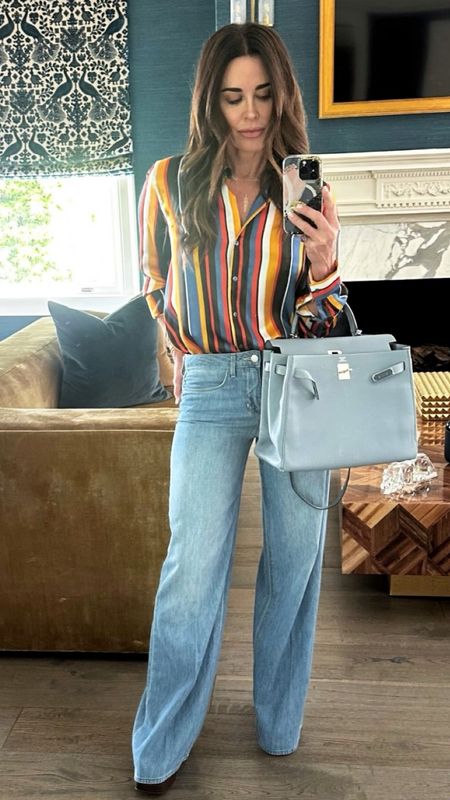 Shop Kyle Richards stripe silk button front shirts baby boot cut high waist jeans #KyleRichards #CelebrityStyle 

#LTKstyletip