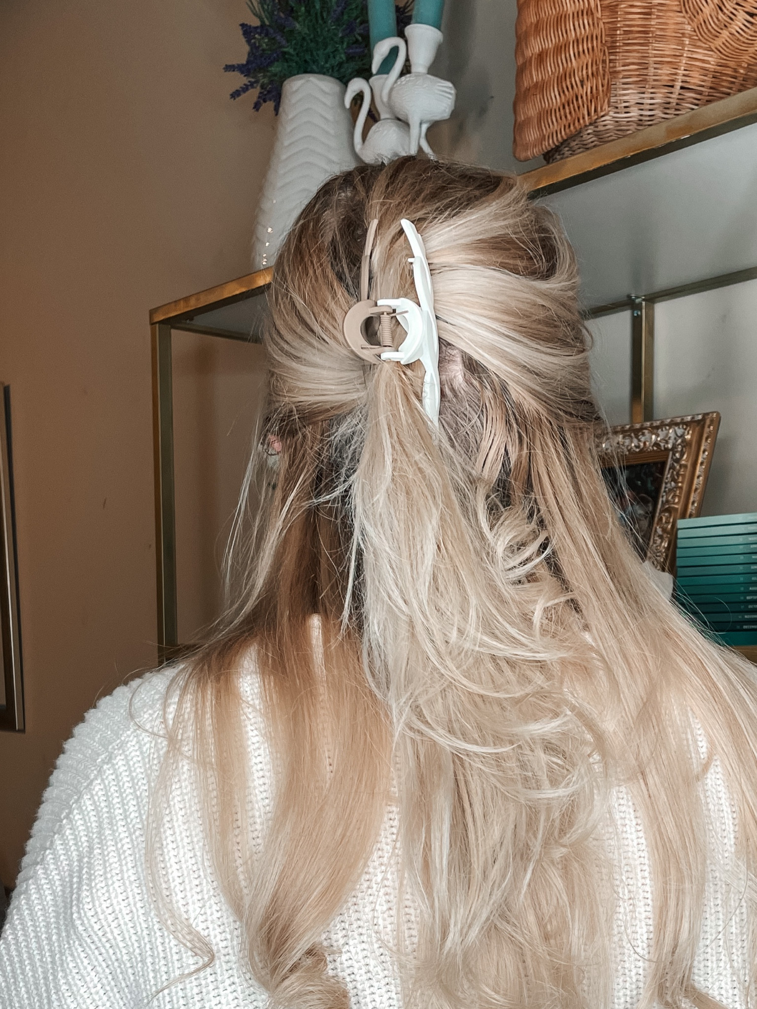 Kind of hard to tell in this picture but this is a half brown, half white claw clip and looks great with neutrals!

#LTKunder50 #LTKbeauty #LTKFind