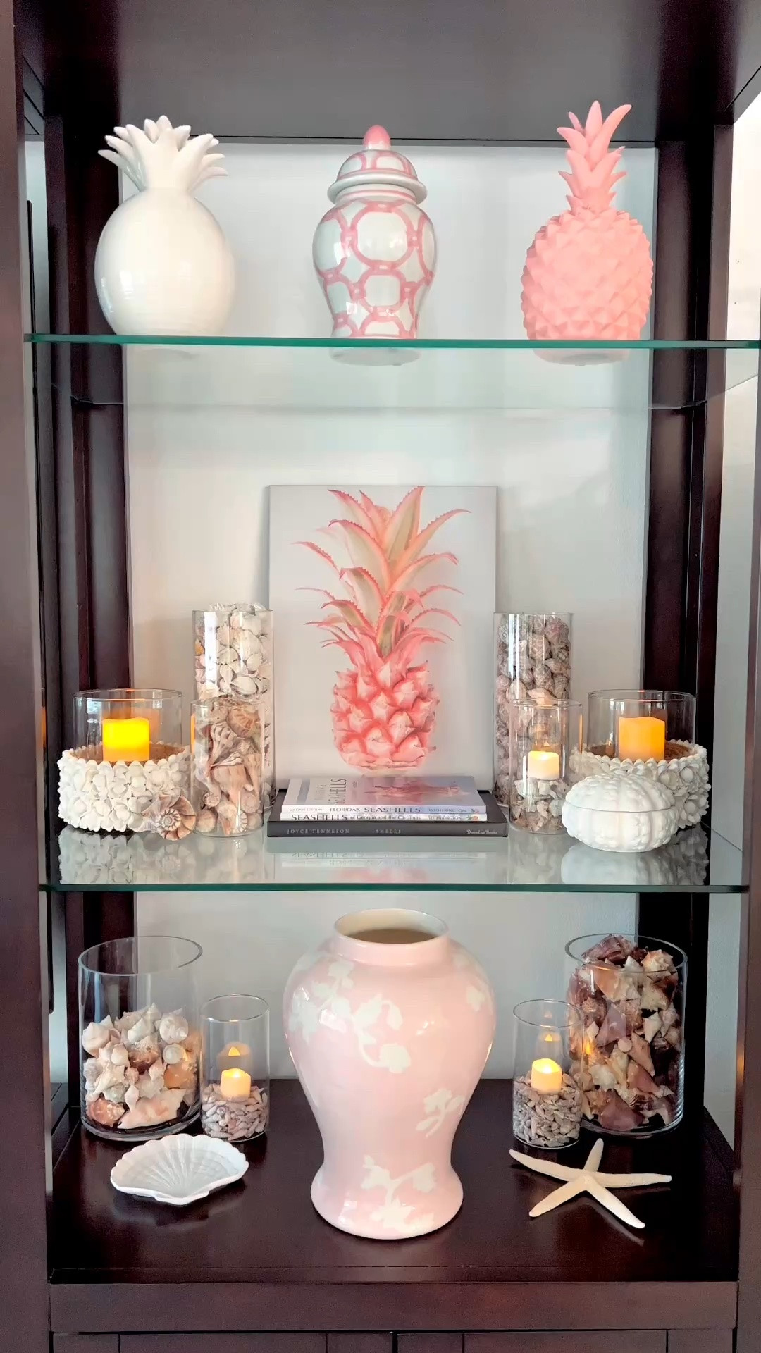 🐚COASTAL HOME DECOR: I wanted to share some of my seashell collection with you. I’ve been shelling at Pass-A-Grille Beach and turned my ocean treasures into home decor!

🐚I purchased glass vases from @amazonhome to showcase all of my seashells. These cylinder vases are so versatile. I’ll be using them all year long.

🐚Also found the cutest ceramic seashell box with lid and seashell trinket dish from @target so cute!

📚Had to throw in my go to seashell books, pineapples and ginger jars that are on repeat year after year.

🍍Going for a pink summer coastal vibe and linking everything for you. Love how it turned out!

#coastaldecor #CLPicks #amazonhome #targethome 

#LTKSeasonal #LTKOver40 #LTKSaleAlert #LTKU #LTKHome #LTKSwim #LTKvlog