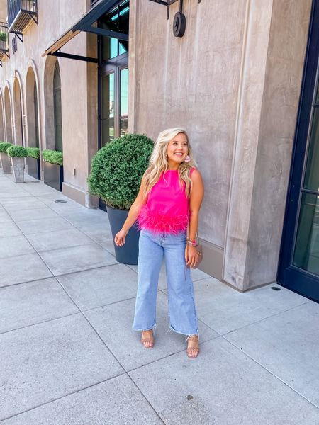 Pink feather top styled with jeans! Wearing a size small and fits true to size. 
#valentinesdayoutfit #holidaystyle #holidayoutift #feathers #pinkoutfit #valentinesday

#LTKfit #LTKSeasonal #LTKstyletip