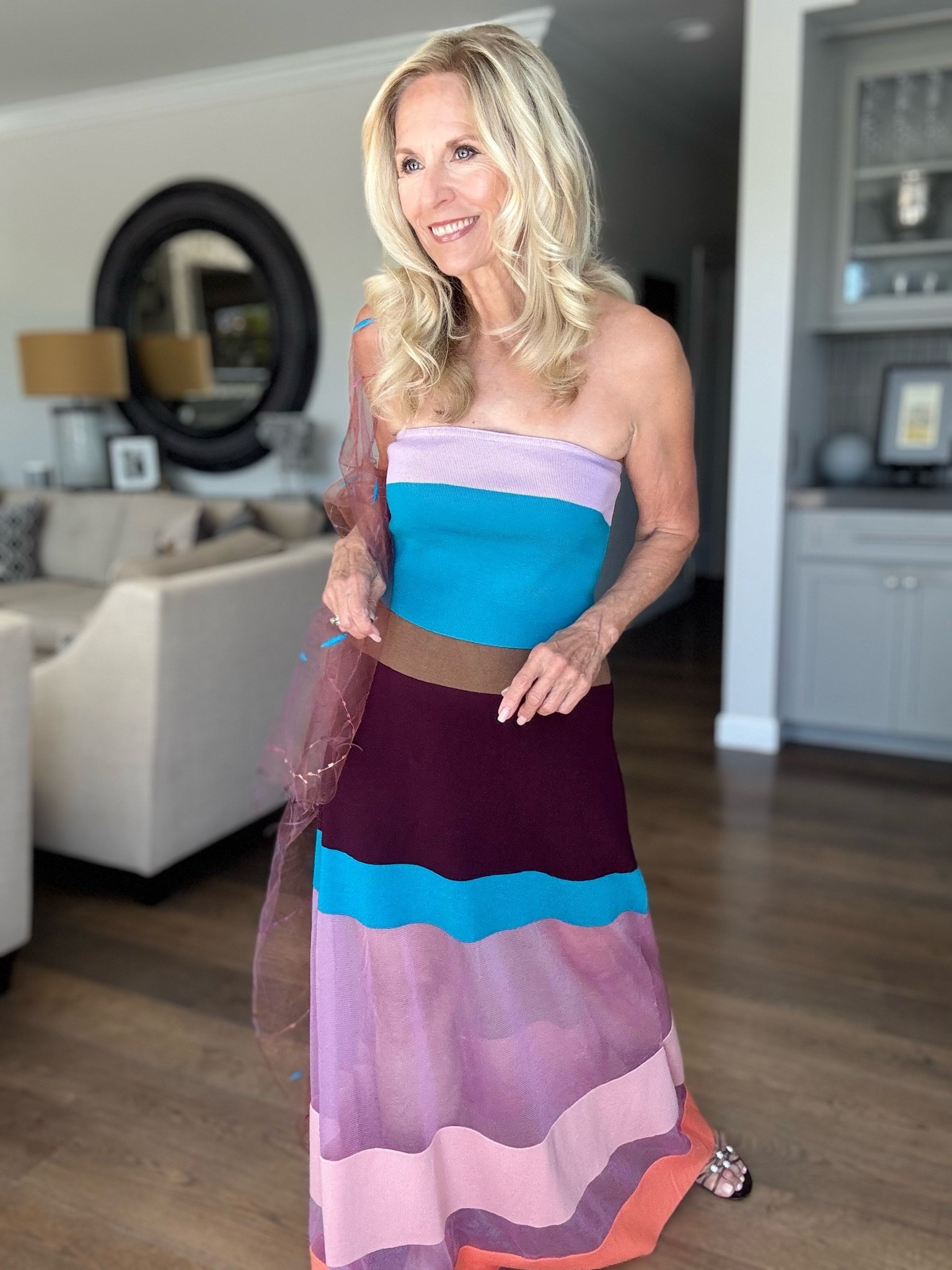 I think this might be my new favorite two- piece dress for vacation, summer, or a special occasion…

It’s knit, it’s colorful and my sheer wrap goes with the sheer part of my skirt. This beautiful wrap is from @artinstitutechi in Chicago and I purchased it when my son was attending the art school there @see_saic It’s a fitting piece of art to go with this outfit.

Let me know in the comments what you think about this two-piece set.

Follow me for more 50+ Style Inspiration.

#LTKOver40