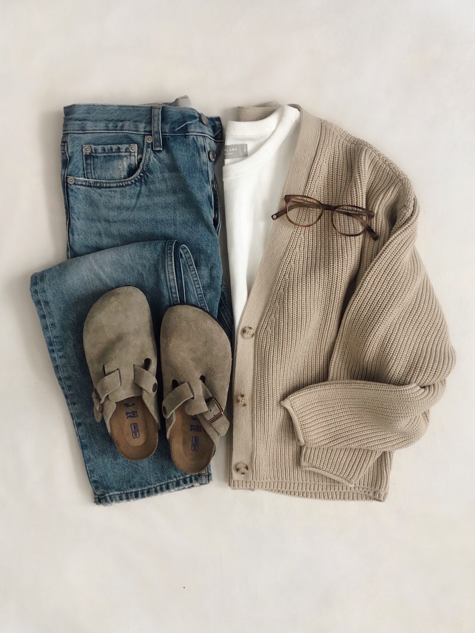 Small in cardigan, small in tee, jeans run very big! Order two sizes down. I found my Birks at Dillard’s, linked to them + at Urban!✨