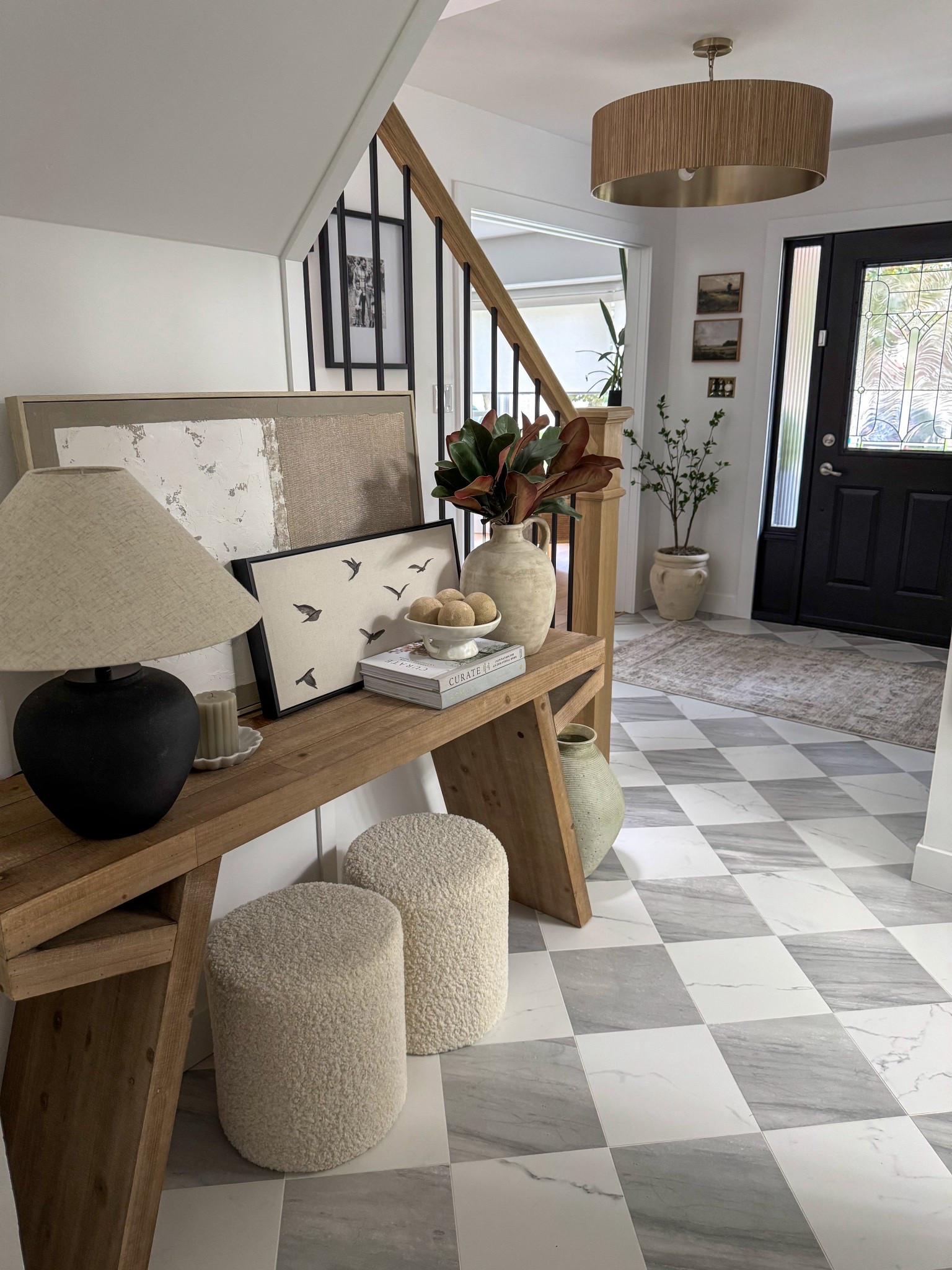 Neutral, cozy & inviting foyer👌🏼

#foyer #console #ottoman #lamp #art #chandelier #rug #decor #foyerdecor

#LTKHome