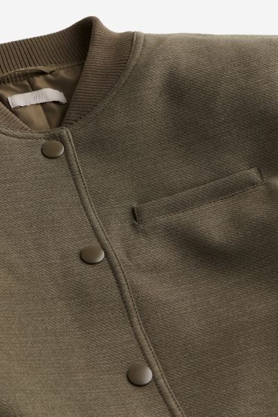 Short Jacket with Shoulder Pads - Round Neck - Long sleeve - Dark khaki green - Ladies | H&M US | H&M (US + CA)