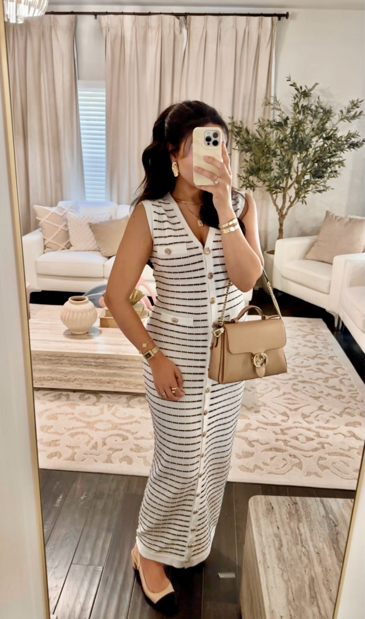 Sleeveless knit maxi striped bwhite & black dress from Commense, linked many similar styles 

#LTKFindsUnder50 #LTKSaleAlert #LTKStyleTip