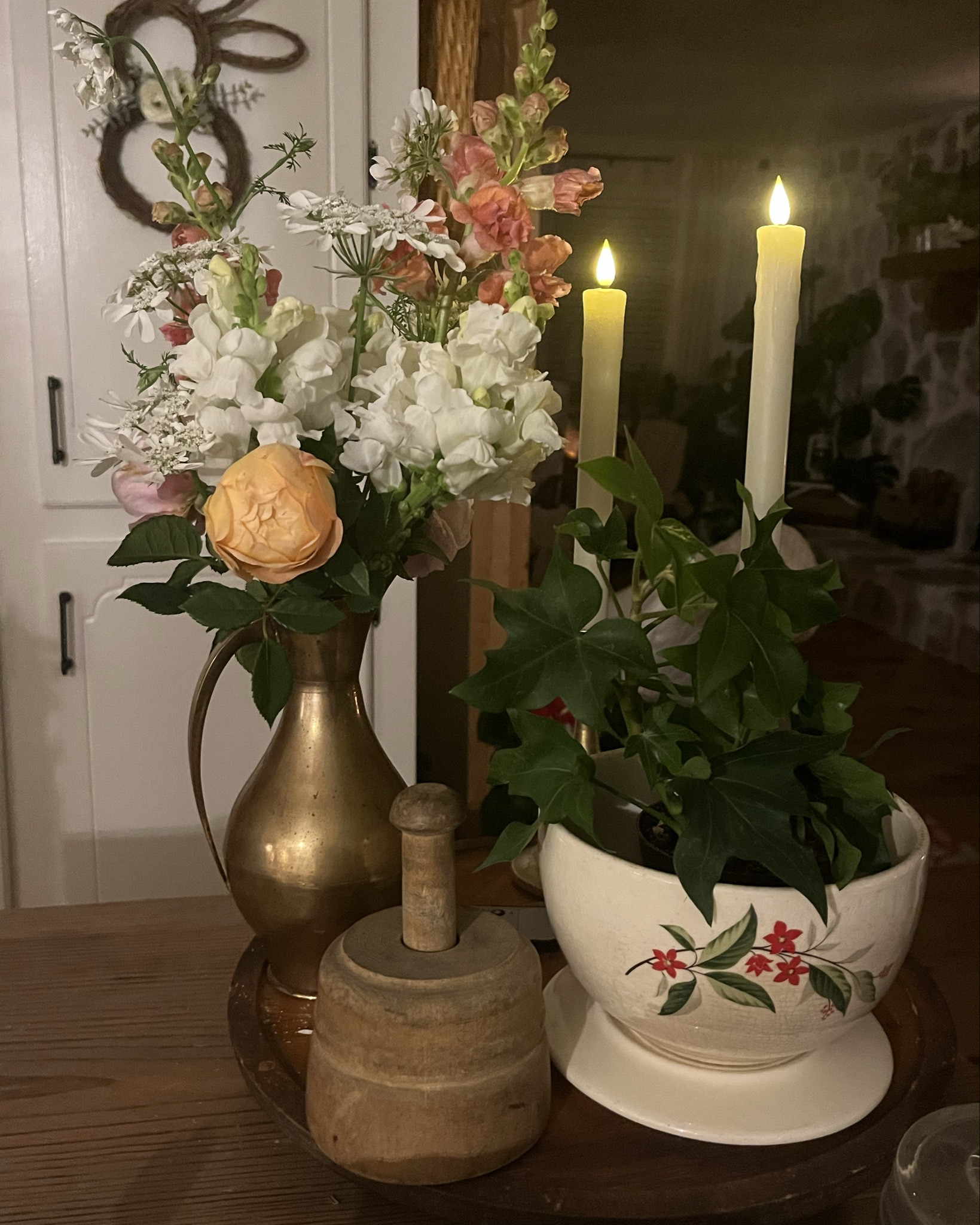 Flameless candles are one of my favorite things to use in decorating.    The add such a cozy feel to your home with their glow.  I always set them on a timer so they come on at dusk, but they come with a remote also.  #candlelight #flamelesscandle 