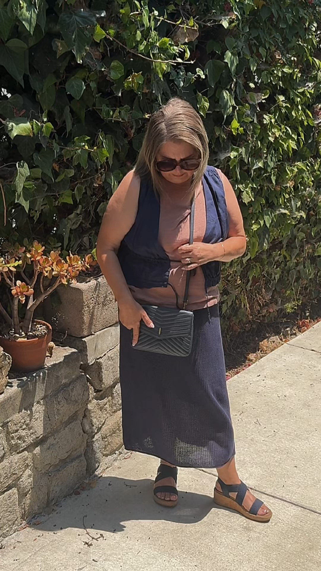 Effortless layers I’m loving: this linen knit skirt + matching navy vest paired with a soft rose parachute tank and finished with my navy Thacker New York bag. Breezy, sustainable, and polished perfect for summer styling.

#LTKFinds #LowToxStyle #SustainableFashion #MadeInIndia #LinenLove #OOTD #ThackerNewYork #LTKStyle

#LTKSeasonal #LTKOver40 #LTKTravel