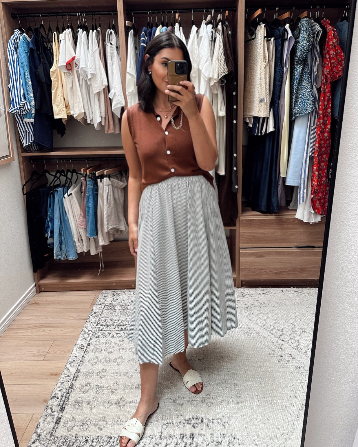 Loved this cotton midi skirt – it’s a nice fit and with pockets! The waistband isn’t too wide or too thick and I noticed it didn’t flare out at my hips as well. All good notes! I am in the large, it fits slightly generously but I prefer this size for comfort. 

Im in the large of the sweater vest, runs generously. 

 