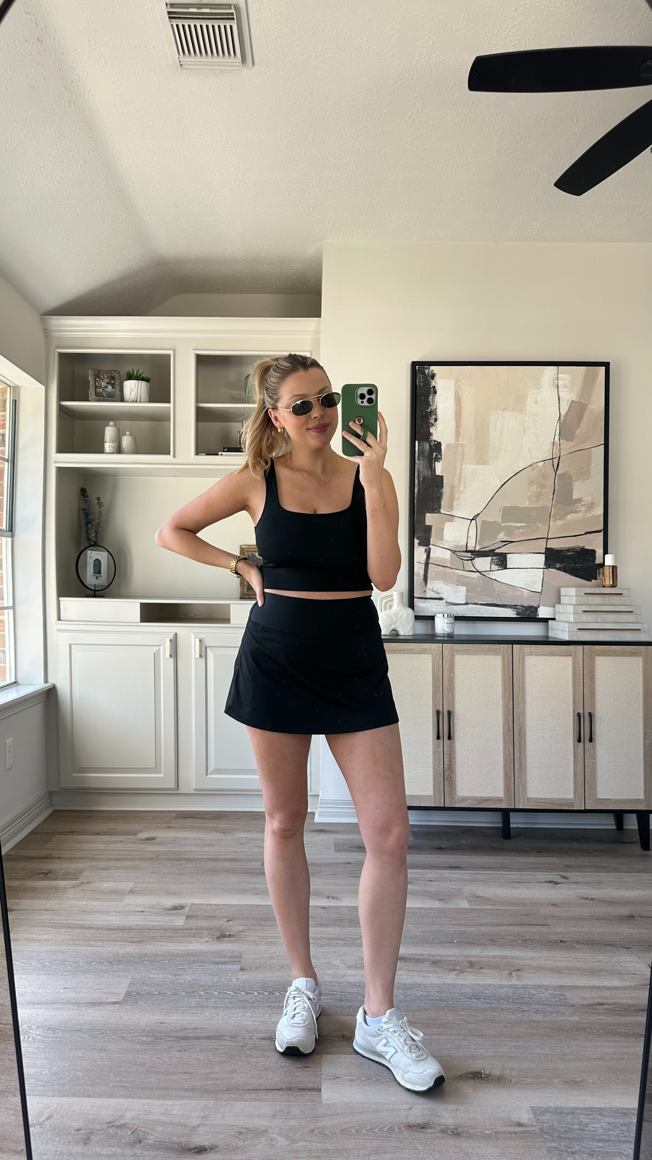 Casual Spring Outfit | Can't go wrong with a black on black outfit, it looks so chic. Wearing size M in the skirt and sports bra tank. Sneakers fit tts. 

 

#LTKActive #LTKStyleTip