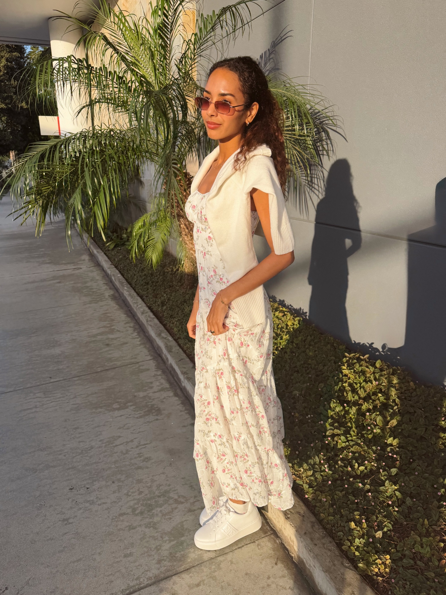 Perfect spring outfit 🌸 

This flowy floral maxi dress is the definition of Spring 2026 style—lightweight, feminine, and perfect for everything from brunch dates to sunset walks. Paired with white sneakers from Frankie4 Footwear and a cozy knit for that elevated casual vibe 🤍

Think: farmers markets, coffee runs, vacation outfits, and everyday soft girl looks 💐

Use code: LTK_LESLIE15 for 15% off @frankie4 footwear 👟

#LTKPetite #LTKSeasonal #LTKootd