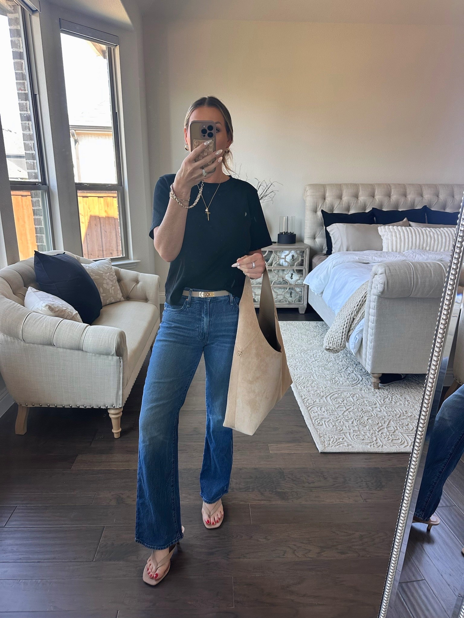 An easy, everyday outfit that proves simple pieces can still feel polished 🤍

I started with a classic black tee from Aritzia (the kind you’ll reach for on repeat), paired with my favorite Mother jeans for that relaxed-but-refined fit. The neutral accessories from Target keep everything feeling light and effortless, and I added a delicate Amazon cross necklace for a subtle finishing touch.

This is one of those real-life outfits that works for everything—errands, lunch, or just wanting to feel put together without overthinking it.

Simple pieces, styled intentionally ✨

#over40style #highlowstyle #everydaystyle #ltkstyle #christianinfluencer

#LTKgrwm #LTKootd #LTKSeasonal