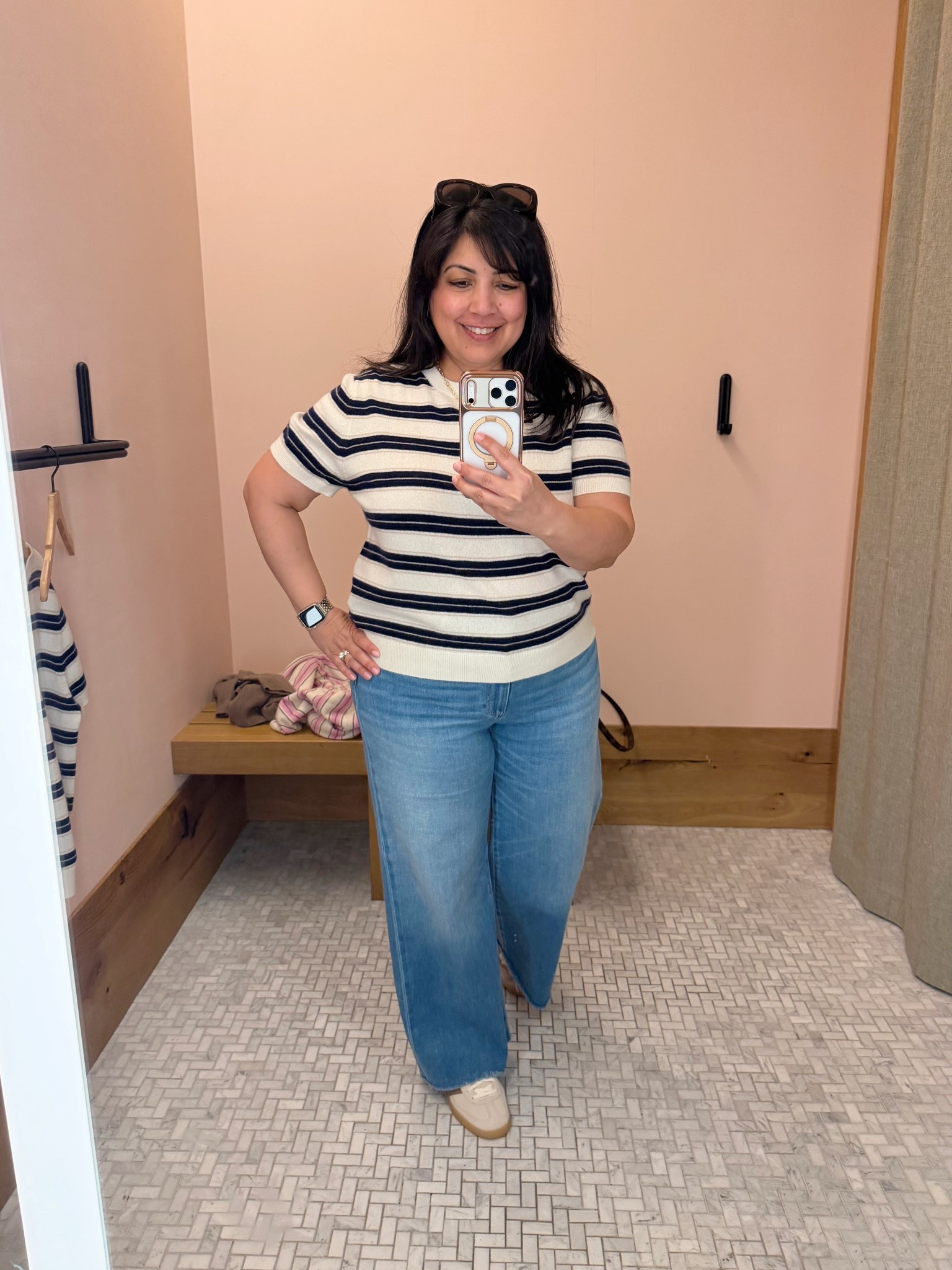 Love this striped cashmere tee for transitioning from winter to spring! Great neutral palette that can be paired with jeans, pants, shorts and skirts. I paired it here with wide leg jeans but this tee would also be perfect with the viral Aritzia lodge pants that can be dressed up or dressed down and make the perfect workwear or travel outfit! 

Aritzia cashmere tee size XL. Paige Anessa wide leg jeans size 32 petite. Adidas handball Spezial sneakers run big. I usually wear a 7.5 or 8 in shoes and I wear these in a size 7.

#LTKMidsize #LTKPetite #LTKOver40