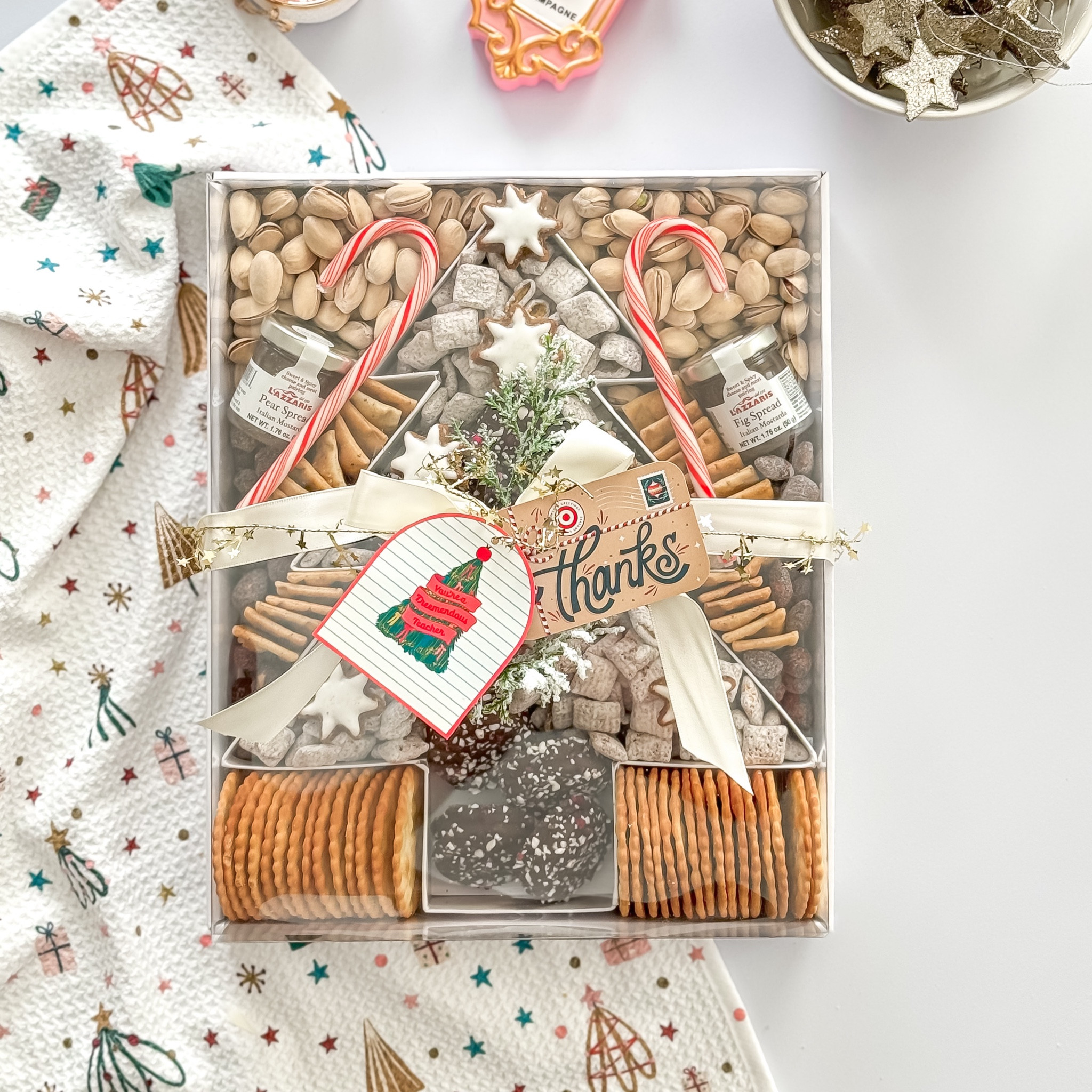 Teacher Gift Idea / Coach Gift Idea

Fill this tree shaped cardboard box  with nuts, cookies, candy & holiday treats and top with gift card! 

#teachergift #coachgift #giftsforher #hostessgift #gift #giftguide 

#LTKGiftGuide #LTKfamily #LTKHoliday