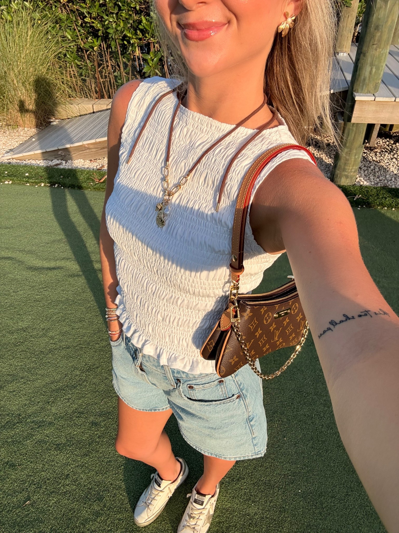 Casual, styled, summer, daytime to dinner outfit inspo. Size XS Aritzia tank top- Size 24 Abercrombie curve love shorts- Gold star Golden Goose shoes- Pearl flower Francesca’s earrings 

#LTKSummerEdit #LTKStyleTip #LTKU
