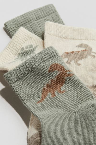 4er-Pack Socken - Mattgrün/Dinosaurier - Kids | H&M DE | H&M (DE, AT, CH, NL, FI)