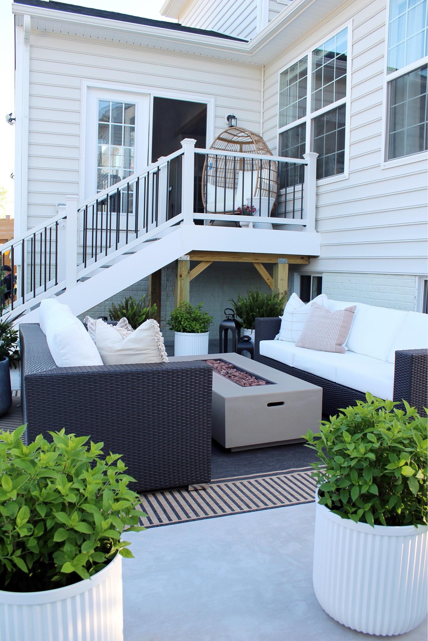 Outdoor furniture, patio furniture, outdoor sofa, outdoor rug, planters, concrete fire pit, outdoor lanterns

#LTKStyleTip #LTKSeasonal #LTKHome