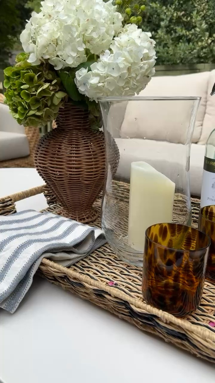 Cozy patio, how we decorate our patio, outdoor table, tablescape, outdoor ideas, outside party ideas, classic home, grandmillennial home, spring patio ideas

#LTKHome