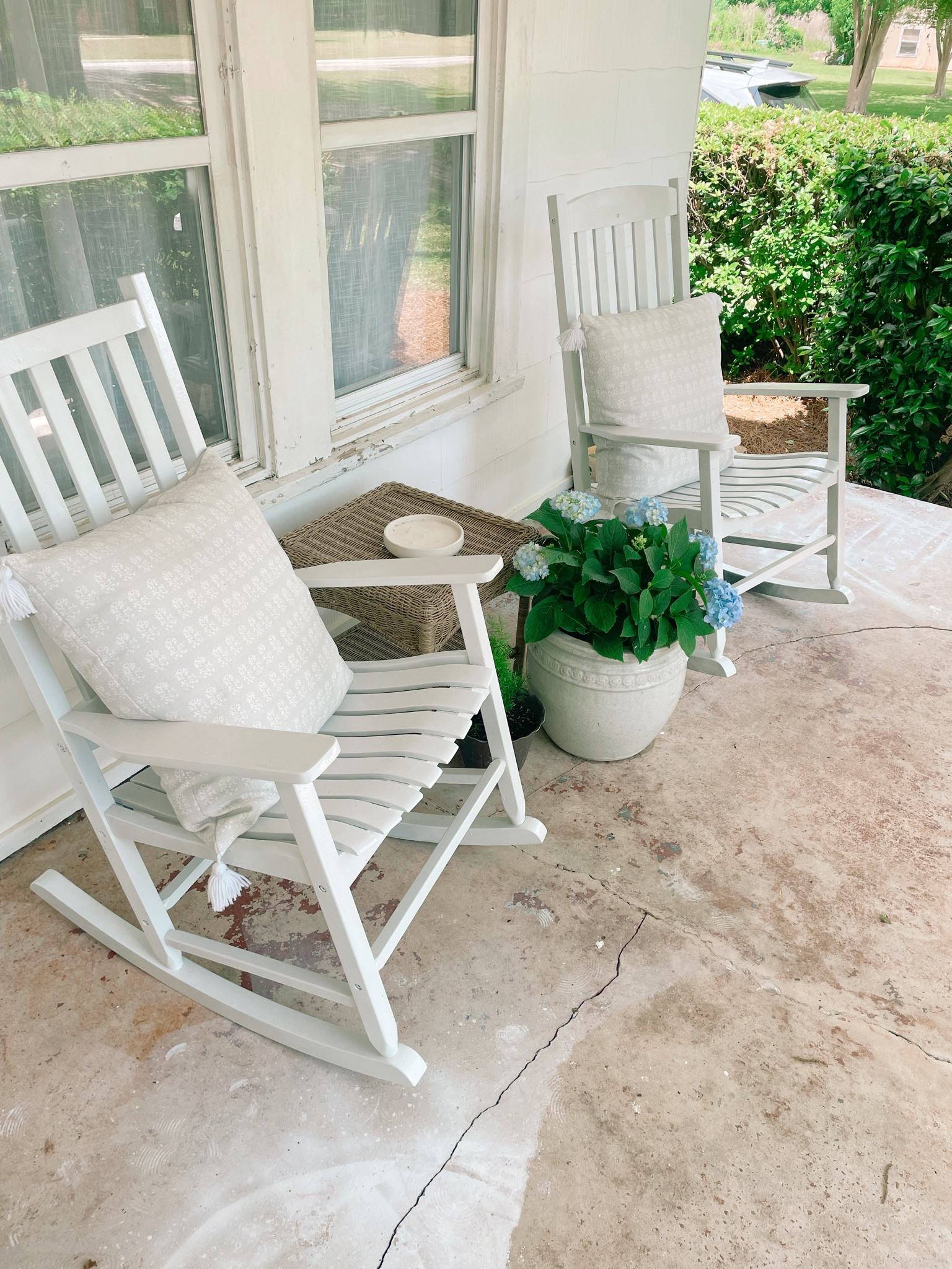 southern front porch

#whitechairs #whiterockingchair #rockingchair #frontporch #floral #pots #outdoortable #wicker #spring