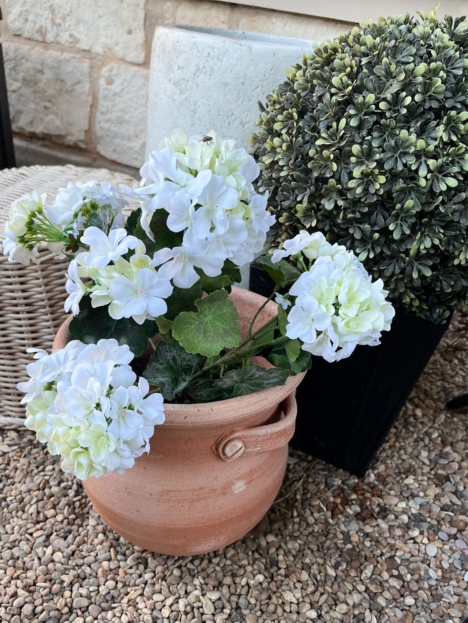 Outdoor, artificial flowers, fake flowers, fake bush, pea gravel 

#LTKhome #LTKstyletip #LTKSeasonal