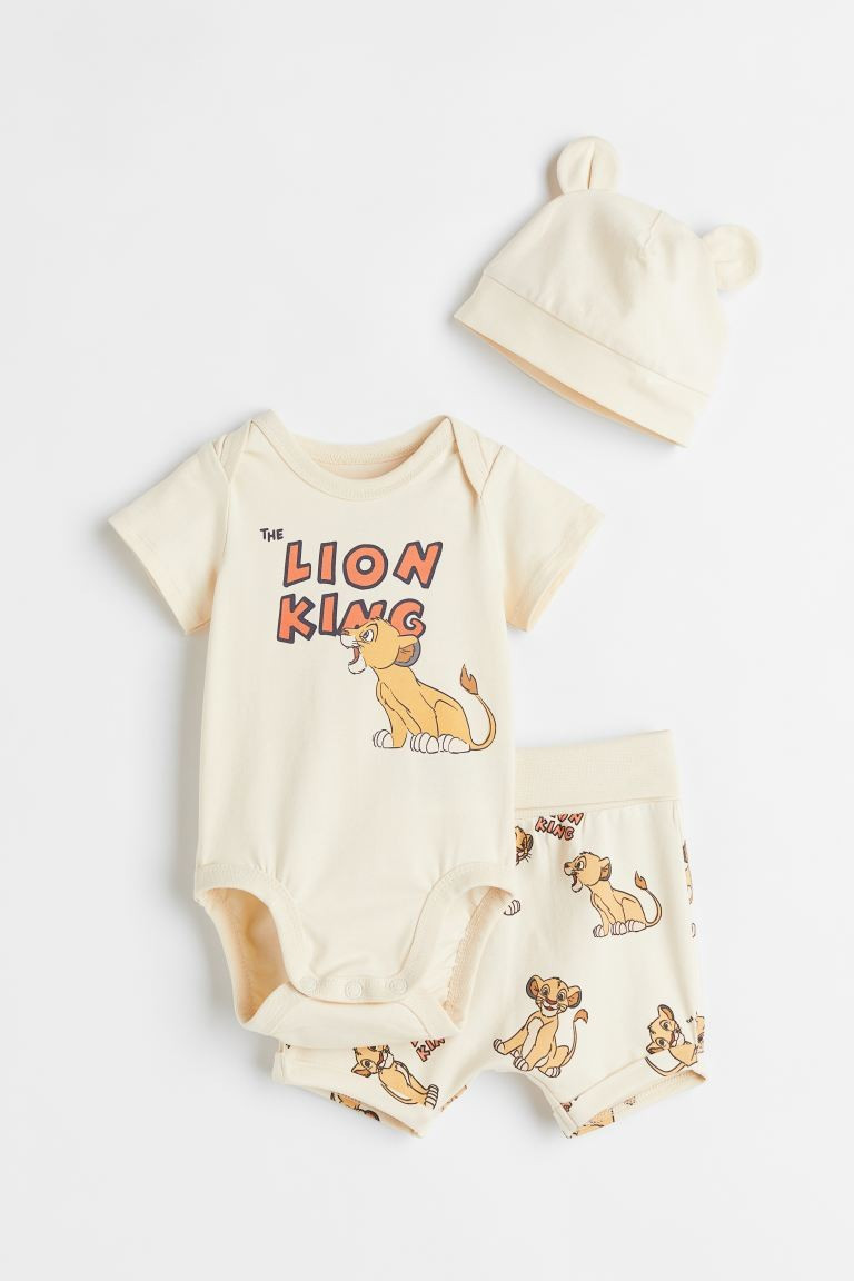 Set with a short-sleeved bodysuit, shorts, and accessory in soft cotton jersey with a printed des... | H&M (US + CA)
