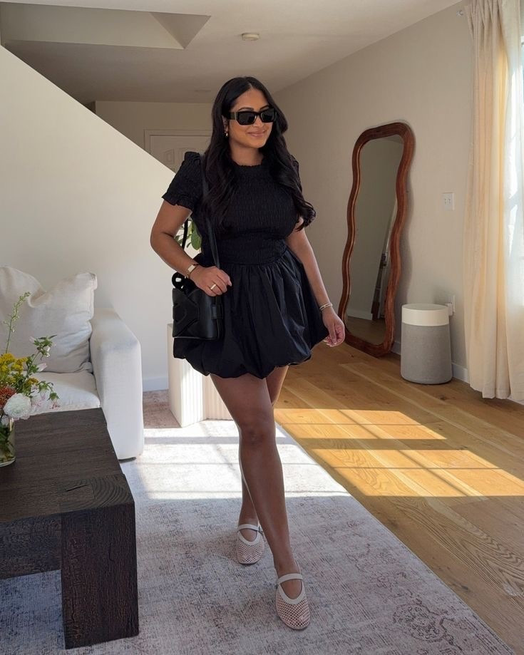 Black dress
White mesh flats 

#LTKFestival #LTKPetite #LTKTravel