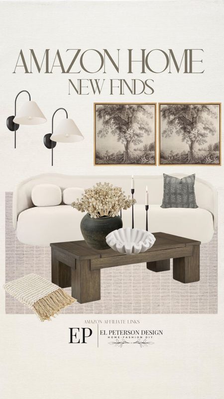 Artwork
Wall sconces
Coffee table 
Vase
Fluted bowl
Candle holder
Throw blanket
Dried stems
Sofa
Area rug

#LTKHome