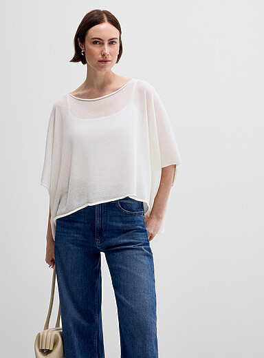 Shimmering fine-knit poncho sweaterExclusive collection from Italy | Simons