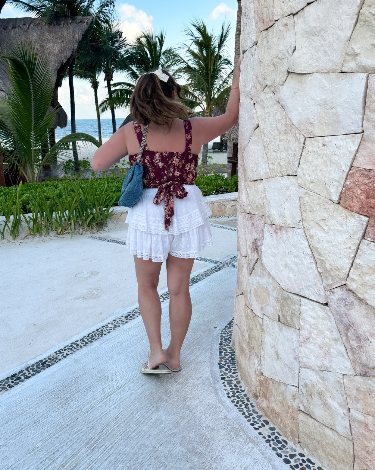 The perfect vacation outfit top 😍 the tie back detail is so pretty. This runs large. Size down 1. I went with a medium and normally a large

My white ruffle shorts are old so I’m linking a similar pair

#LTKSeasonal #LTKMidsize #LTKSaleAlert