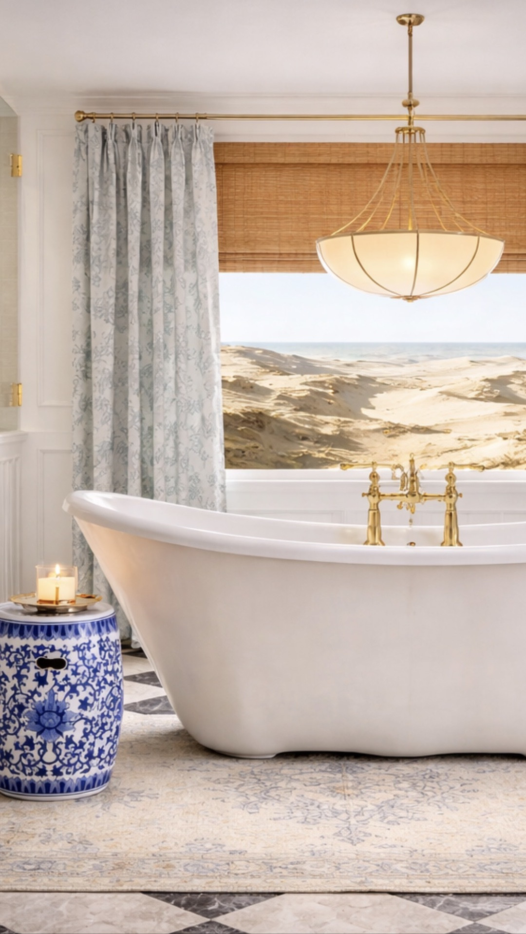 Coastal grandmillennial dreams ☁️💙

This bathroom came together so beautifully with the warm wood vanity, blue floral pinch pleat curtains, bamboo shade, checkerboard marble flooring, and the prettiest designer-look-for-less lighting. I love how the soft neutrals balance the darker wood tones while still keeping that collected, timeless feel.

Sharing sources for the vanity look, mirrors, sconces, rugs, curtains, and more in my LTK ✨

coastal grandmillennial bathroom, wood vanity bathroom, blue pinch pleat curtains, bathroom lighting, designer look for less, luxury bathroom inspiration, Greek Villa walls, coastal bathroom decor, timeless bathroom design, traditional bathroom, marble checkerboard floor, brass bathroom fixtures, bathroom remodel ideas, classic coastal interiors

#LTKHome